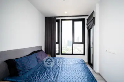 Modern bedroom with city view and stylish decor