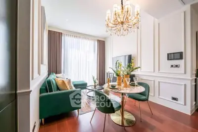 Luxurious living room with elegant chandelier and modern decor