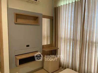 Modern bedroom with stylish wooden accents and natural light