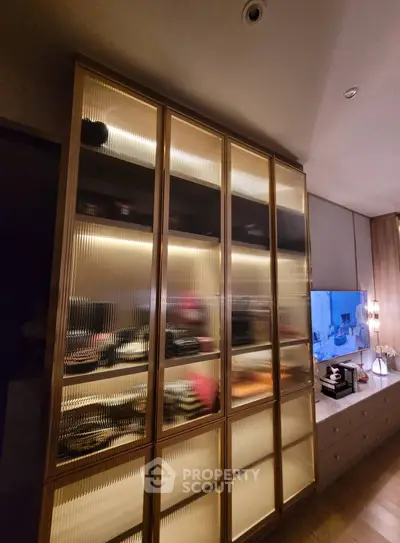 Luxurious modern living room with elegant glass cabinet and ambient lighting