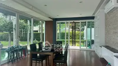 Spacious dining area with garden view and modern design