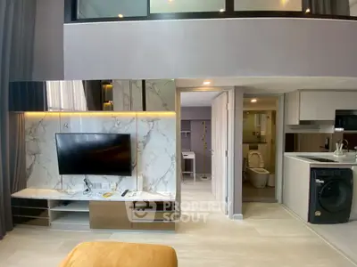 Modern studio apartment with sleek interior design and built-in appliances