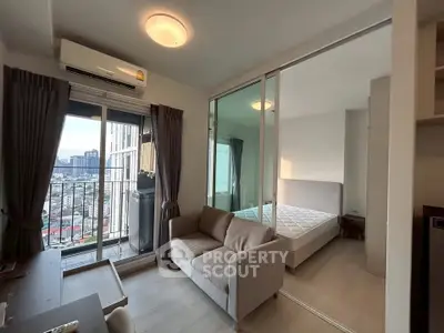 Modern apartment with glass-walled bedroom and city view balcony