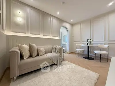 Elegant living room with modern decor and cozy seating area