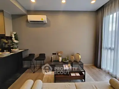 Modern living room with sleek furniture and natural light