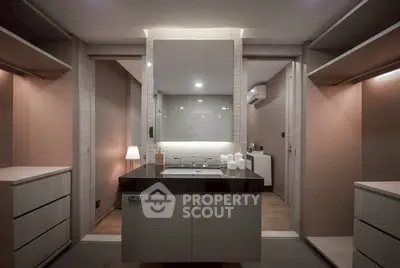 Luxurious modern bathroom with sleek design and ambient lighting