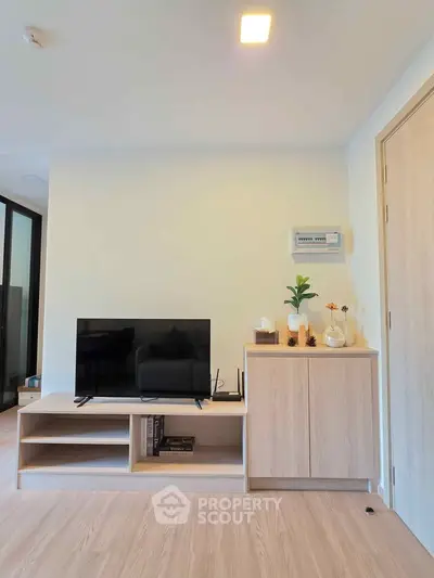 Modern living room with sleek TV stand and minimalist decor