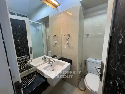 Modern bathroom with sleek fixtures and elegant tile design