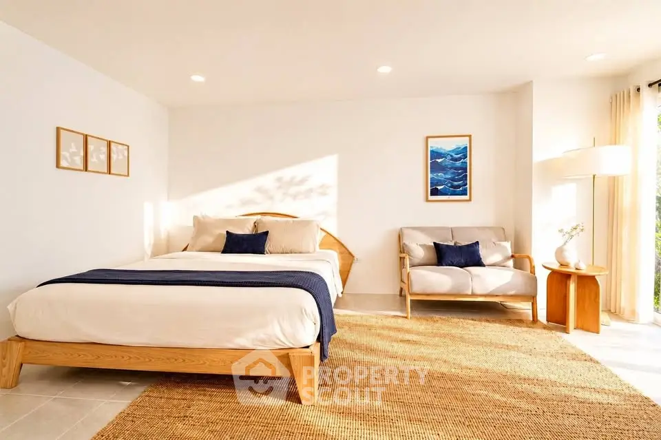 Spacious and bright bedroom with modern decor and natural light