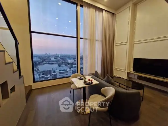 Luxurious living room with stunning city view and elegant decor