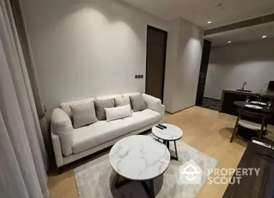 Modern living room with stylish furniture and open layout, perfect for contemporary living.