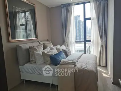 Luxurious bedroom with city view and elegant decor in modern apartment