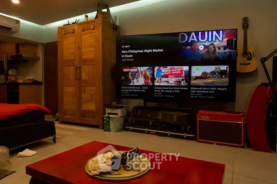 Cozy living room with modern entertainment setup and stylish decor