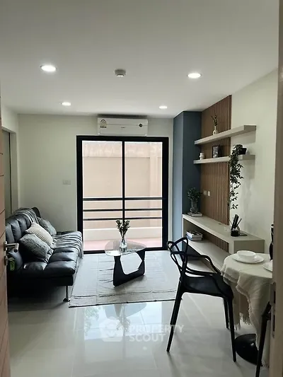 Modern living room with sleek furniture and natural light