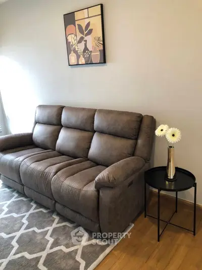 Cozy living room with plush brown sofa and stylish decor