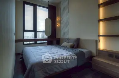 Modern bedroom with large window and stylish lighting, offering a cozy and elegant atmosphere.