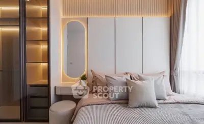 Luxurious modern bedroom with elegant lighting and plush bedding