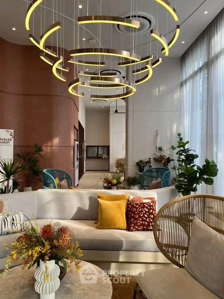 Luxurious modern living room with elegant lighting and stylish decor, perfect for sophisticated urban living.