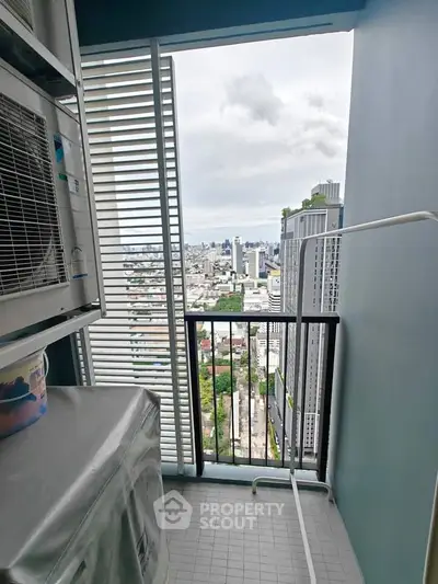High-rise balcony with stunning cityscape view, perfect for urban living enthusiasts.
