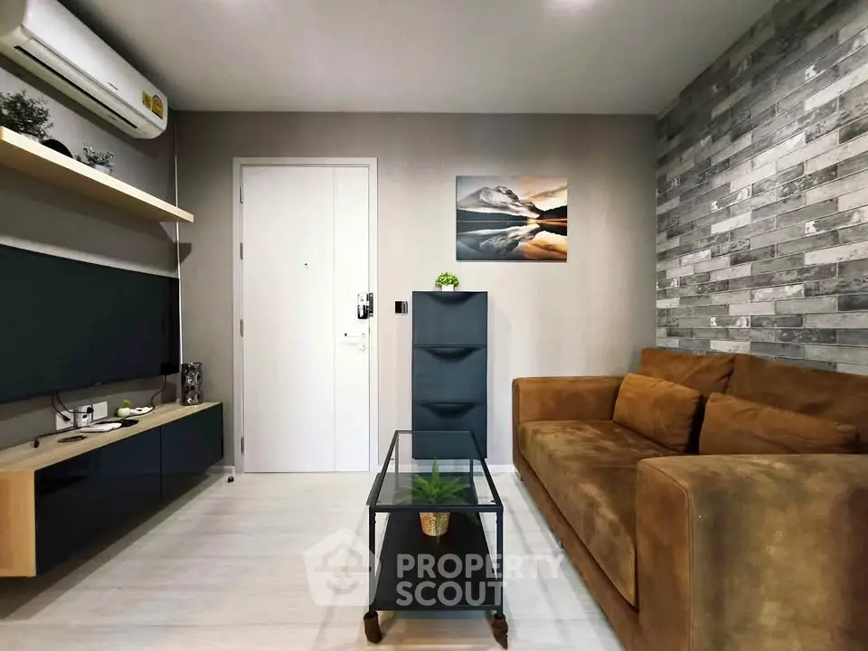 Modern living room with stylish decor and cozy brown sofa