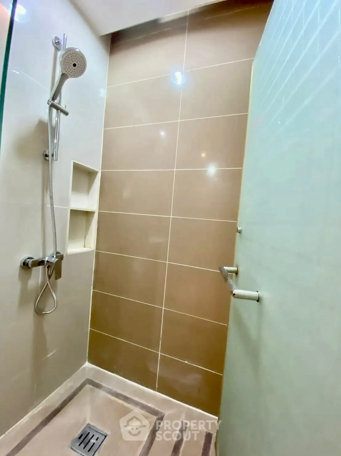 Modern bathroom with sleek shower design and elegant tile work