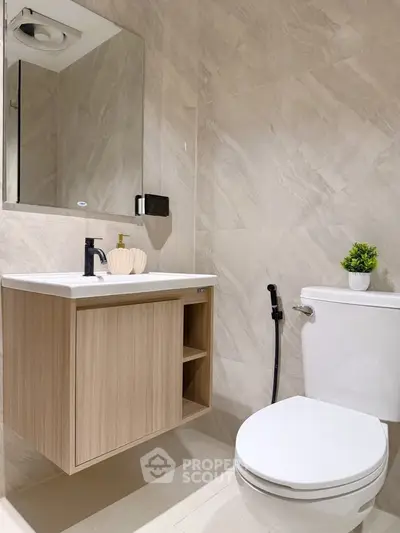Modern bathroom with sleek fixtures and elegant tile design
