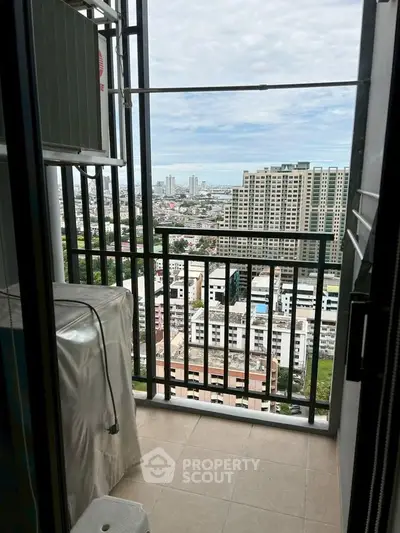 High-rise balcony with stunning cityscape view, perfect for urban living enthusiasts.