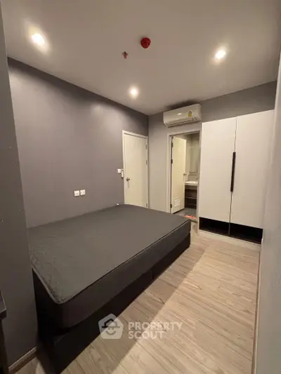 Modern bedroom with sleek design and minimalist furniture