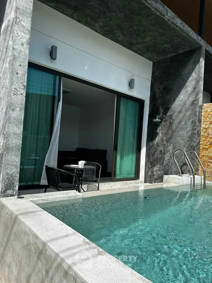 Luxurious modern villa with private pool and stylish outdoor seating area, perfect for relaxation and entertainment.