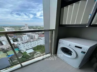 High-rise balcony with washing machine and stunning city view