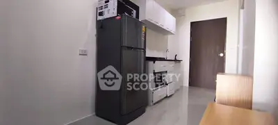 Modern kitchen with sleek appliances and minimalist design