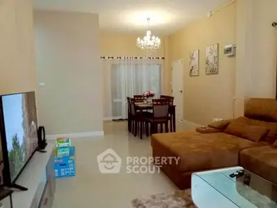 Spacious living room with elegant dining area and modern decor