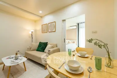 Modern living room with cozy dining area and stylish decor