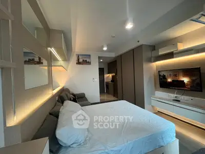 Modern bedroom with stylish decor and ambient lighting