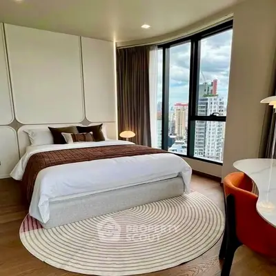 Luxurious bedroom with city view, modern decor, and stylish furniture.