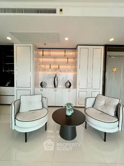 Elegant living room with modern chairs and stylish decor