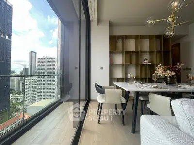 Luxurious dining area with city view, modern decor, and elegant furnishings in high-rise apartment.