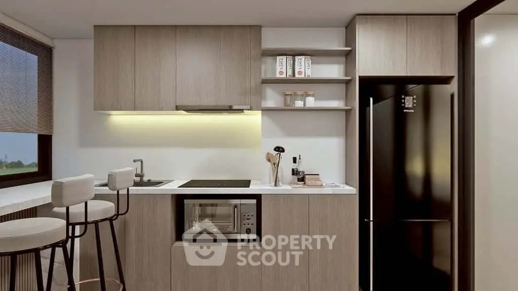 Modern kitchen with sleek cabinetry and built-in appliances