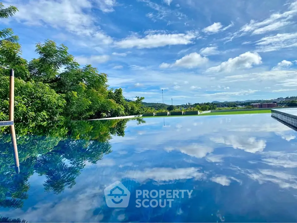 Stunning infinity pool with breathtaking panoramic views and lush greenery.