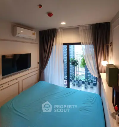 Cozy bedroom with balcony view in modern apartment