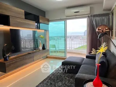 Modern living room with sleek furniture and stunning balcony view