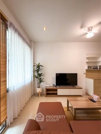 Modern living room with sleek furniture and natural light