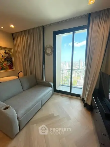 Modern living room with balcony view in high-rise apartment