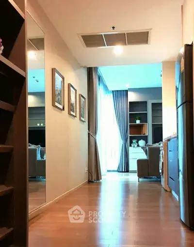 Spacious modern living room with wooden flooring and stylish decor