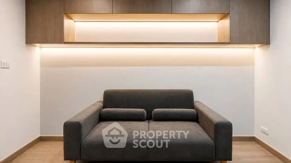 Modern living room with sleek sofa and ambient lighting