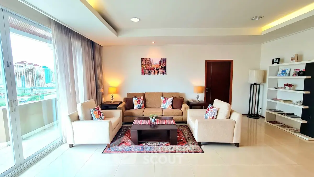 Spacious living room with modern decor and city view, featuring elegant furniture and natural light.