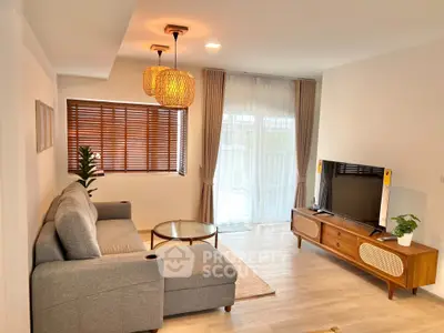 Modern living room with stylish furniture and natural light