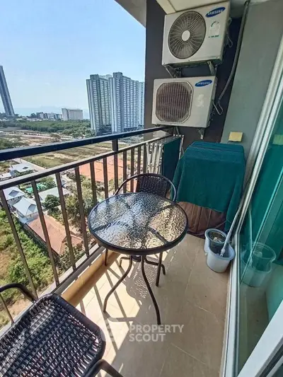 Charming balcony with city view, perfect for relaxation and enjoying the skyline.
