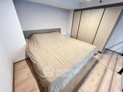 Spacious bedroom with modern design and ample storage space