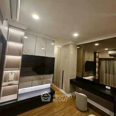 Modern living room with elegant decor and built-in shelving